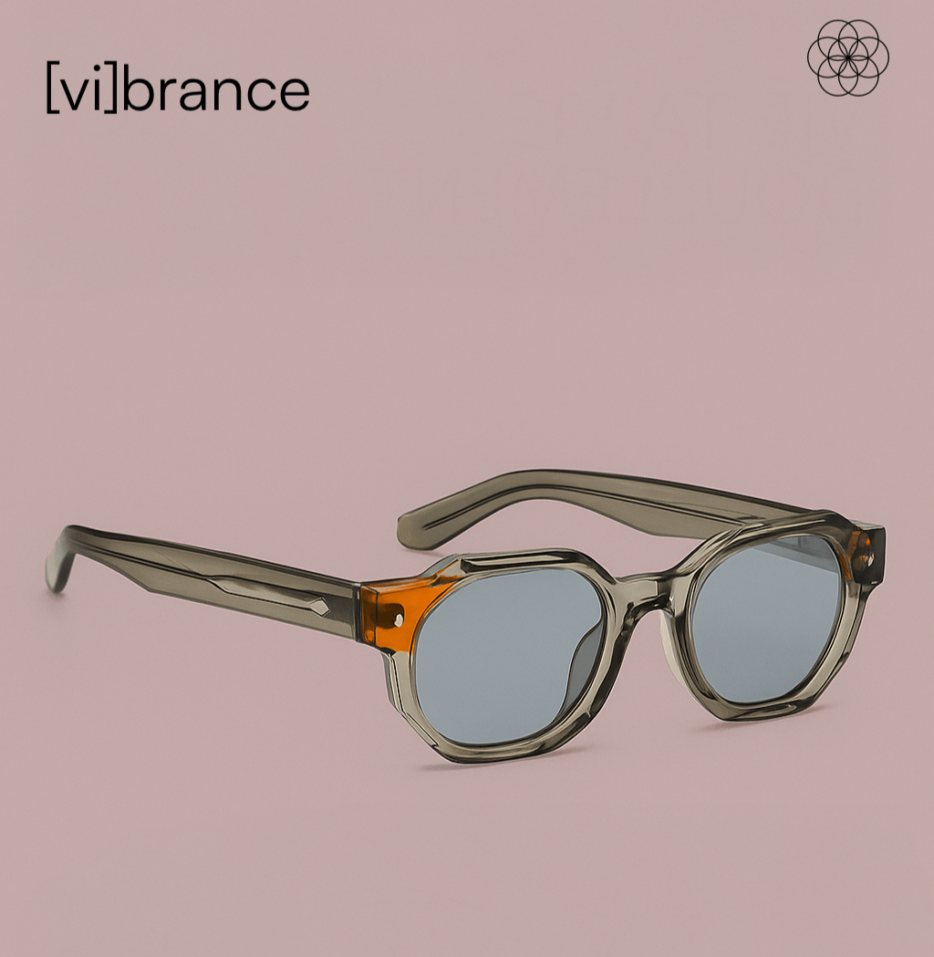 Sunglasses with a gradient design on a pink background, featuring the brand '[v]ibrance'.